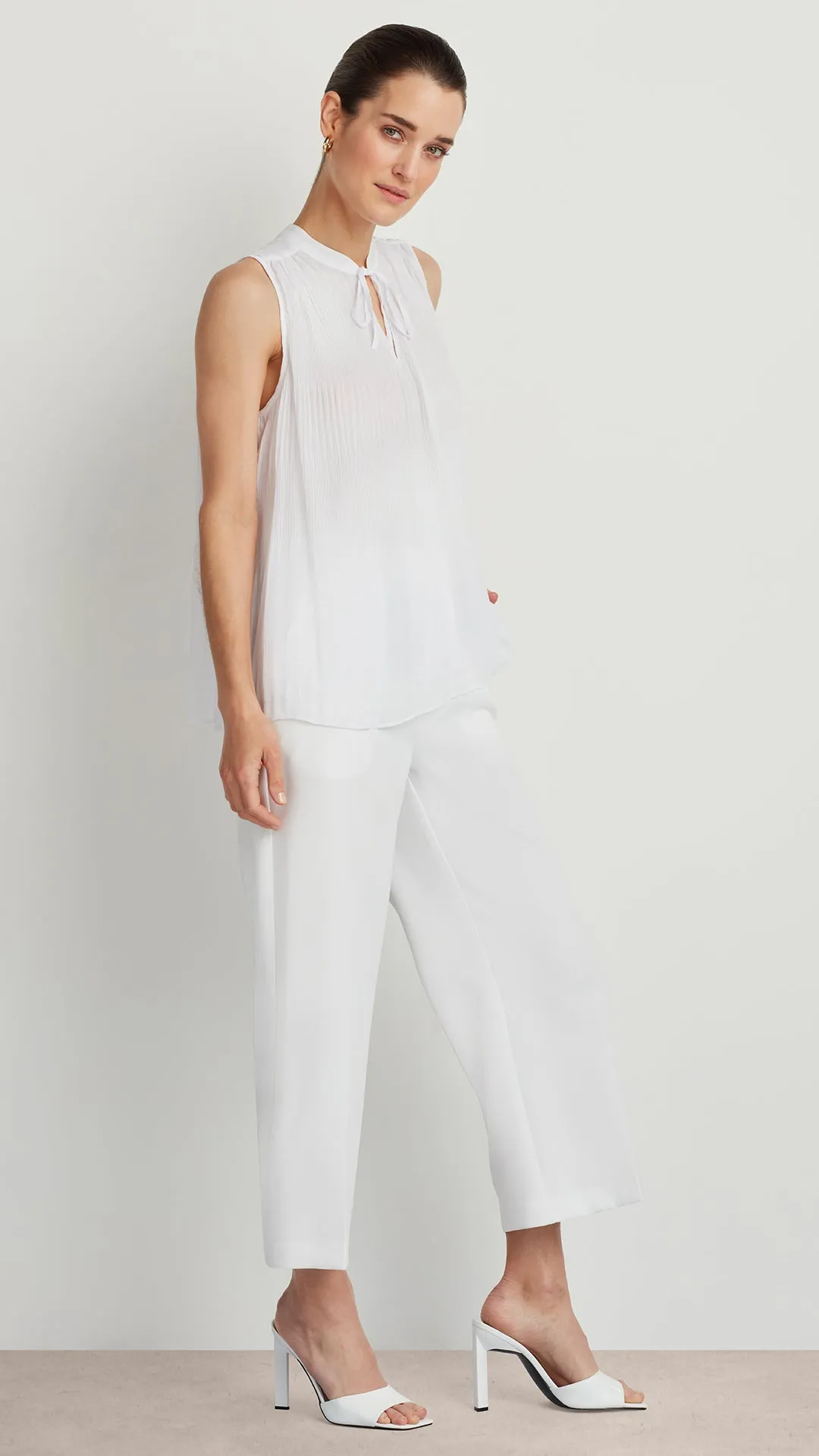 SLEEVELESS PLEAT AND RELEASE TOP